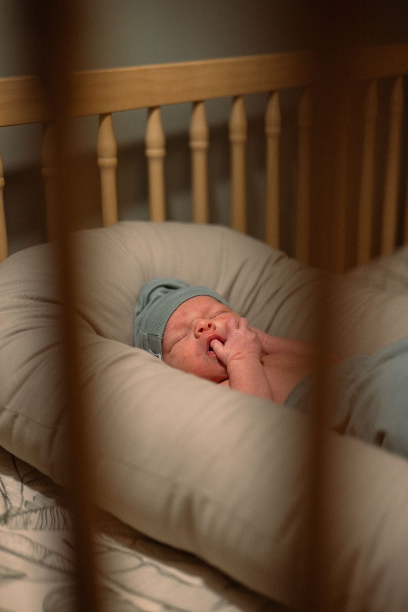 Newborn in crib