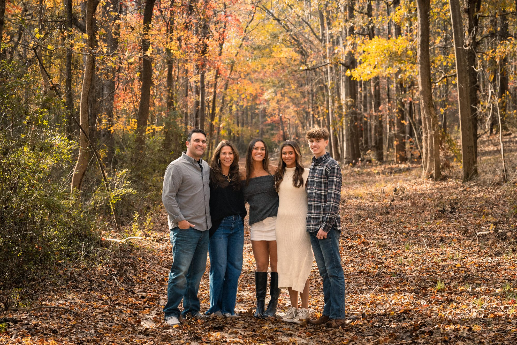 Family portrait in autumn woods